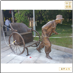 景區拉車(chē)人物(wù)銅雕塑