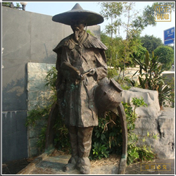 古代人物(wù)捕魚銅雕塑